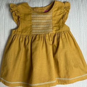 Isaac Mizrahi kids lined smocked dress in size 18M.